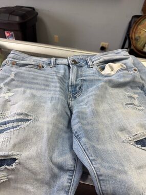 American Eagle Outfitters Light Blue Denim Jeans with Brown Patch